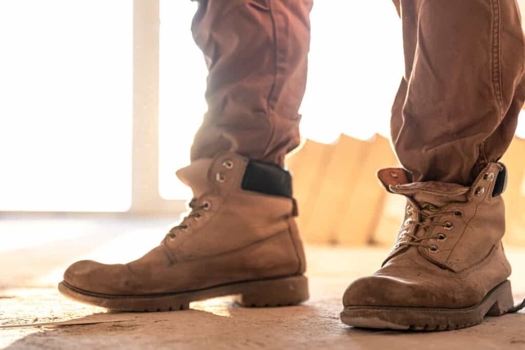 Close-up of slip-resistant work boots designed to reduce fall risks in industrial environments