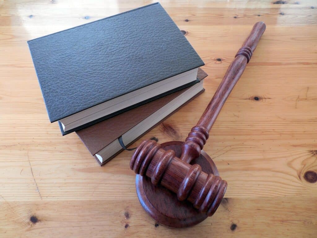 Judge’s gavel and law books representing the legal process in California Lemon Law cases.